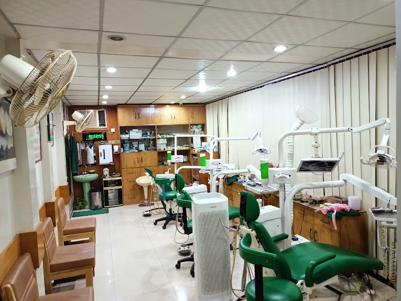 Tanima Dental  Care logo
